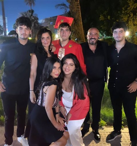 غادة عادل تختفل بتخرج نجلها على شاطئ البحر